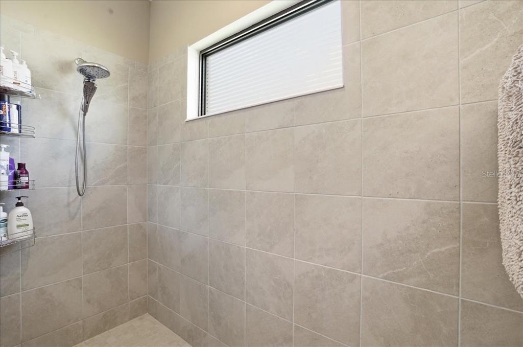 3511 Azurite Way Bradenton, FL 34211 - Photo 29 of 64 a bathroom with a shower