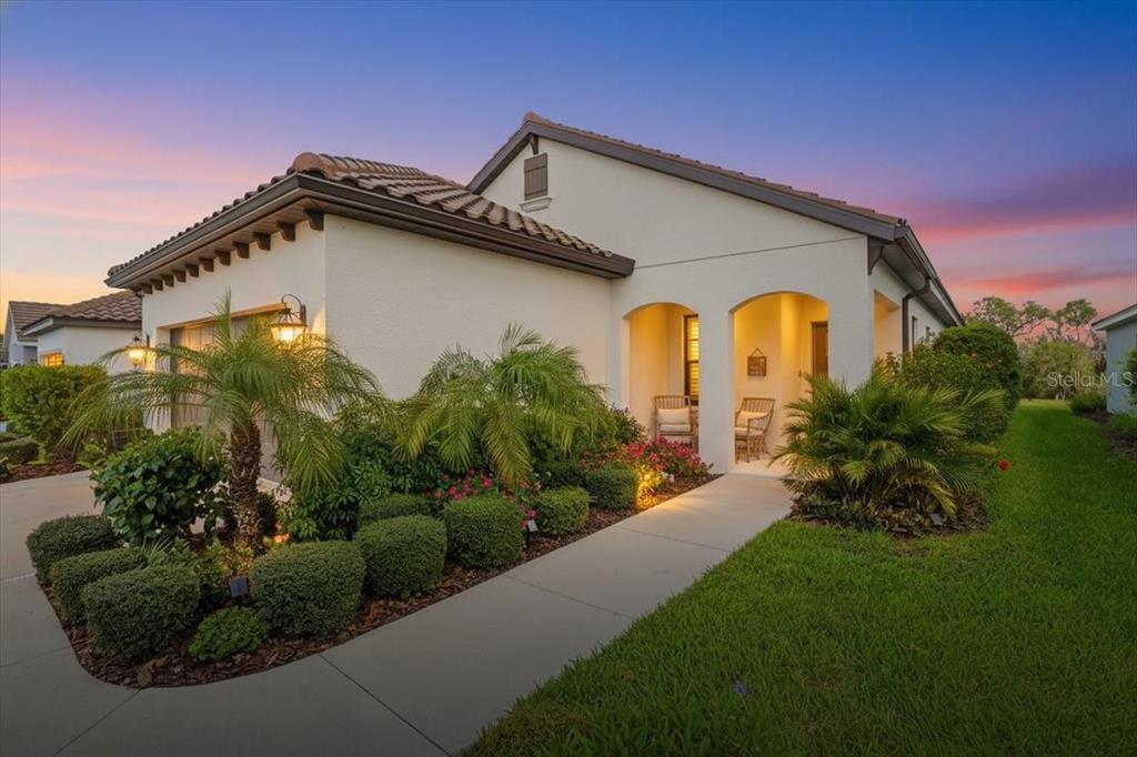 3511 Azurite Way Bradenton, FL 34211 - Photo 3 of 64 a front view of a house with a yard