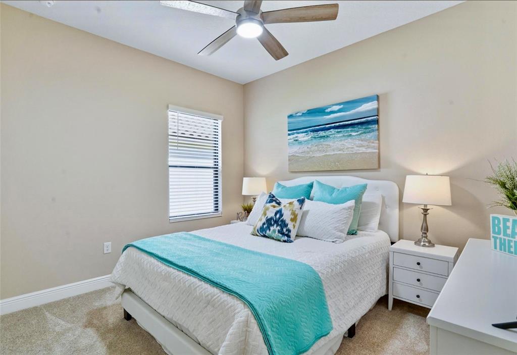 3511 Azurite Way Bradenton, FL 34211 - Photo 34 of 64 a bedroom with a bed and a window