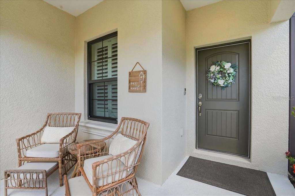 3511 Azurite Way Bradenton, FL 34211 - Photo 4 of 64 a view of a workspace with furniture and a window