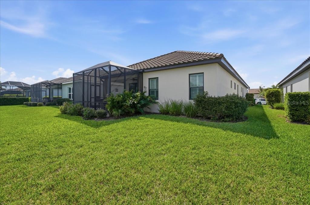 3511 Azurite Way Bradenton, FL 34211 - Photo 45 of 64 a view of a house with backyard and garden
