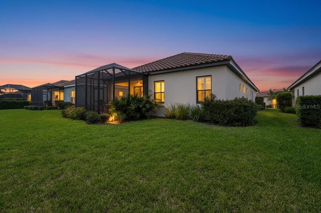 3511 Azurite Way Bradenton, FL 34211 - Photo 46 of 64 a front view of a house with garden