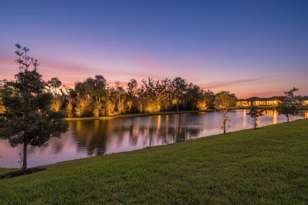 3511 Azurite Way Bradenton, FL 34211 - Photo 48 of 64 a view of a lake with houses in the back