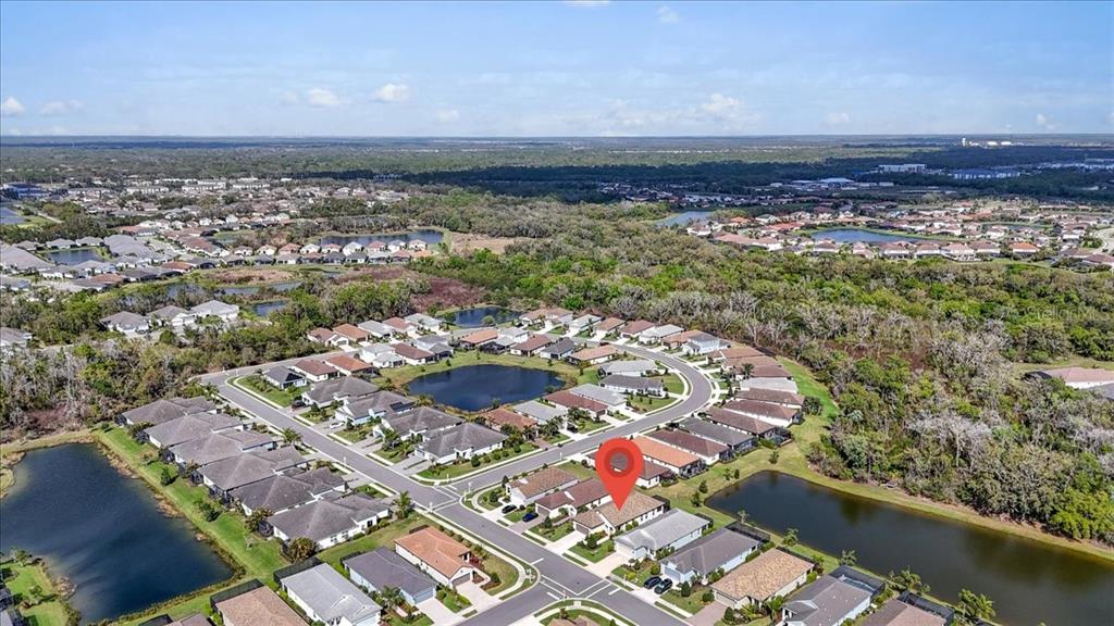 3511 Azurite Way Bradenton, FL 34211 - Photo 51 of 64 an aerial view of a house with a yard