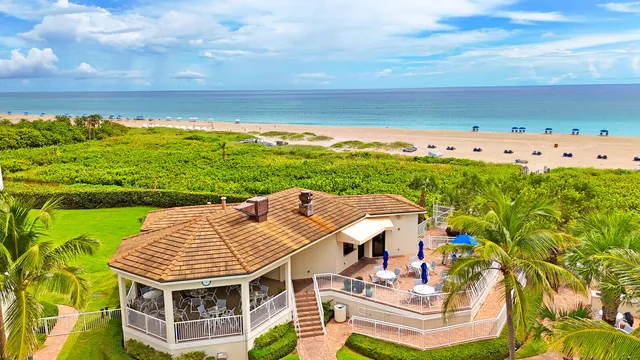 a view of a city with tall buildings and lake