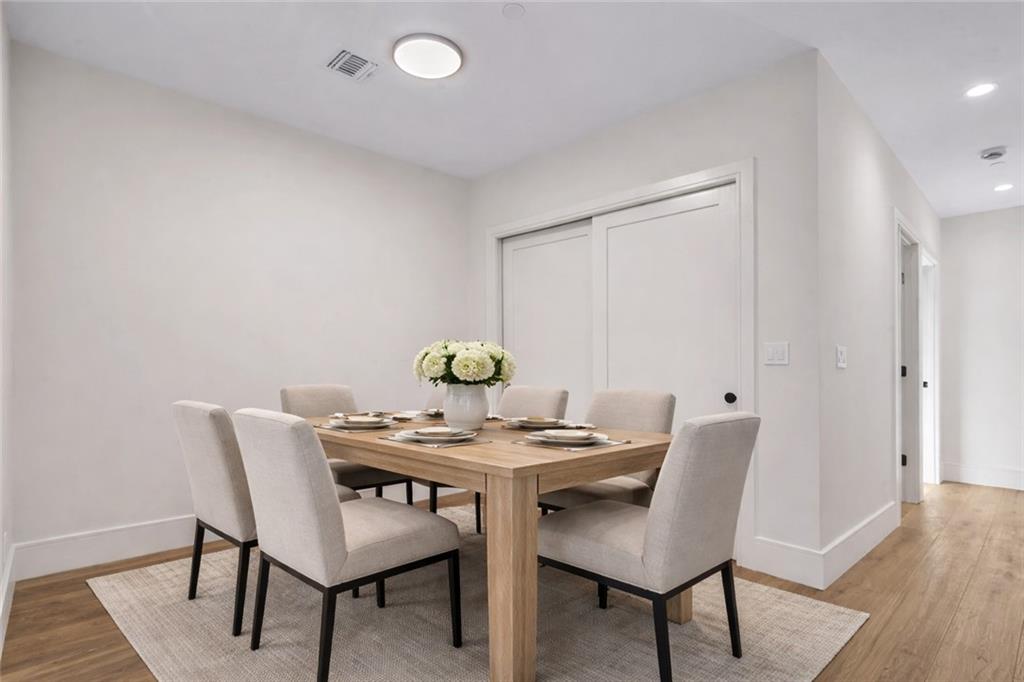 266 10th Street, Unit 2 Brooklyn, NY 11215 - Photo 6 of 17 a view of a dining room with furniture and wooden floor
