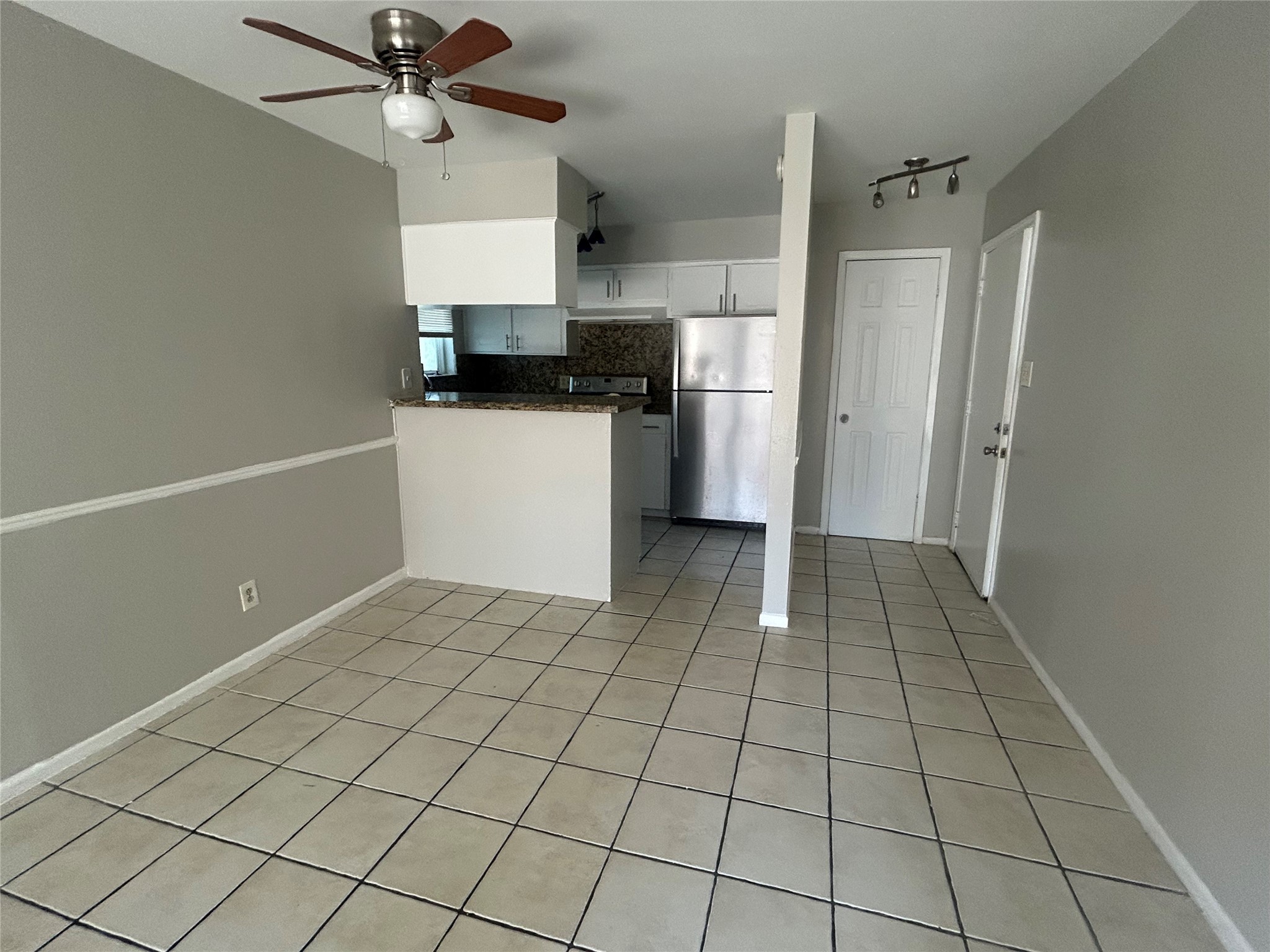 6702 Biggs Court, Unit 4 Houston, TX 77061 - Photo 6 of 6 a view of an empty room and window