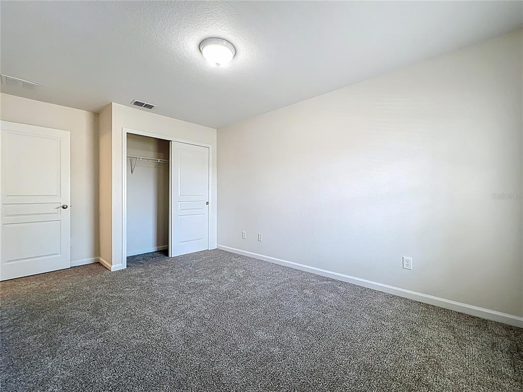 12930 Vennetta Way Windermere, FL 34786 - Photo 25 of 38 an empty room with an entryway