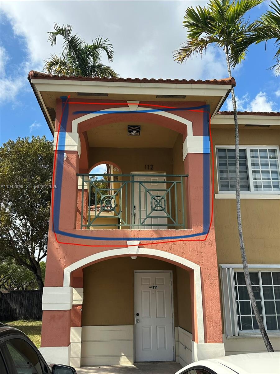 15250 Southwest 134th Place, Unit 112 Miami, FL 33177 - Photo 17 of 17 a front view of a house