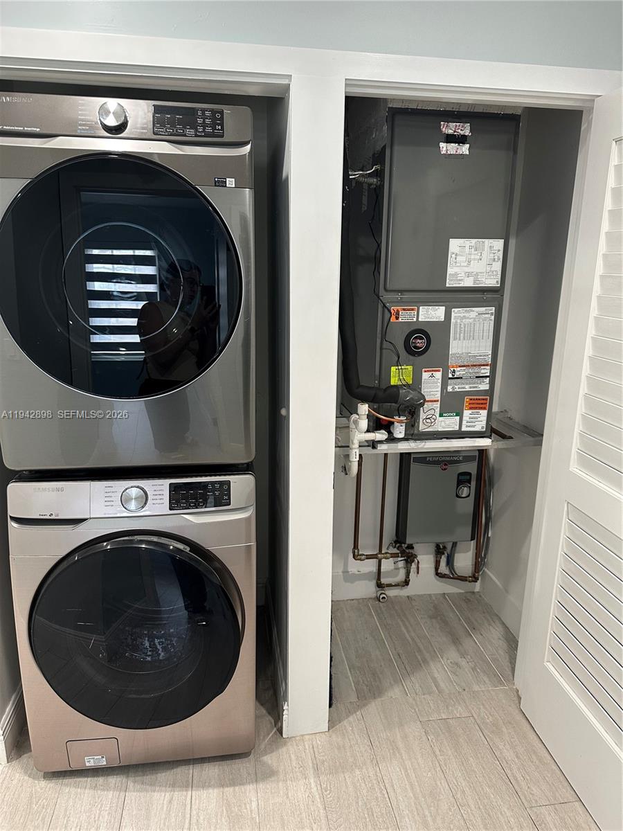 15250 Southwest 134th Place, Unit 112 Miami, FL 33177 - Photo 5 of 17 a close view of a washer and dryer