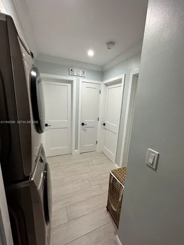a bathroom with a shower and a tub