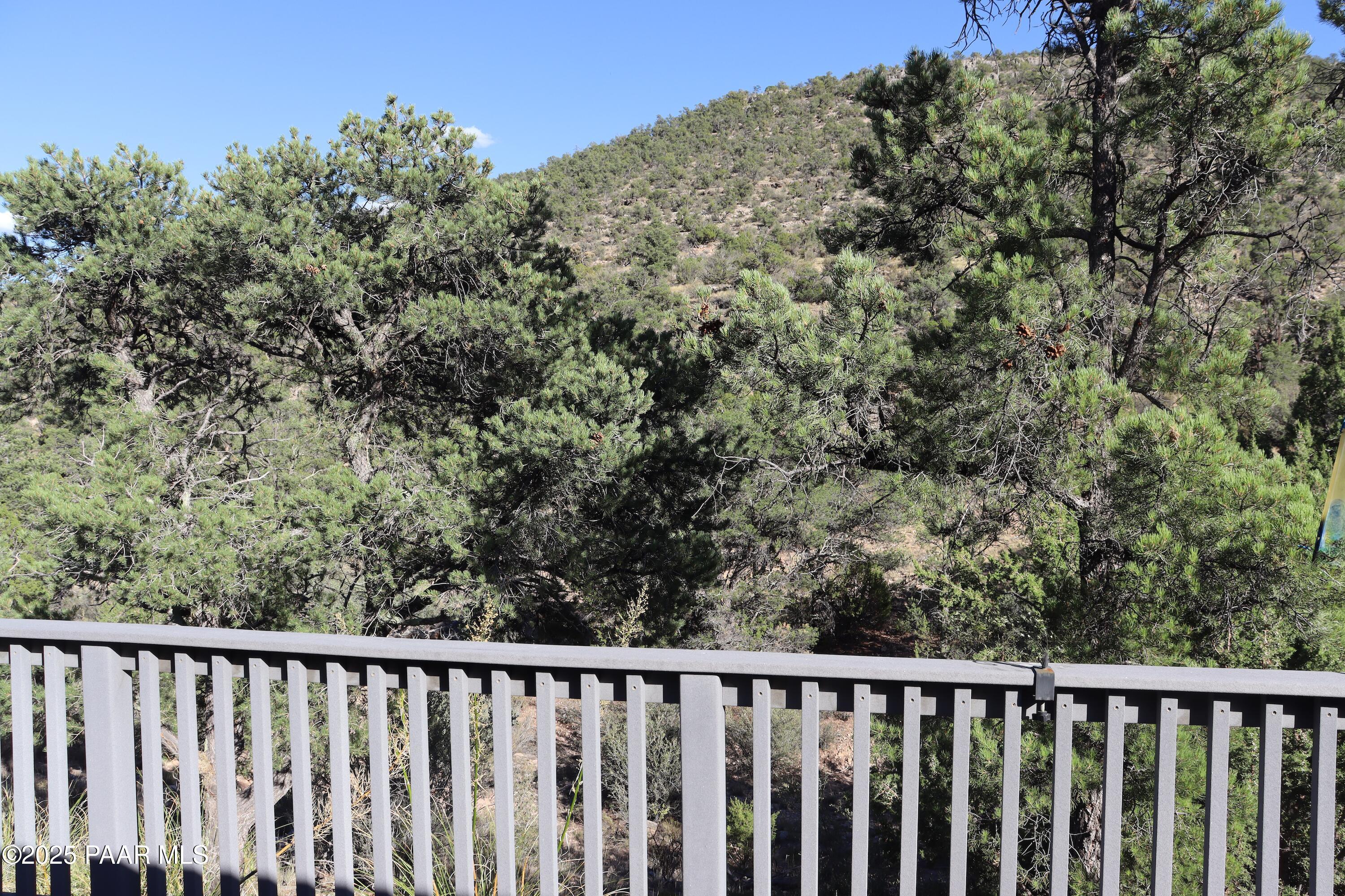 3085 North Diablo Road Chino Valley, AZ 86323 - Photo 11 of 24 a balcony with wooden floor and fence