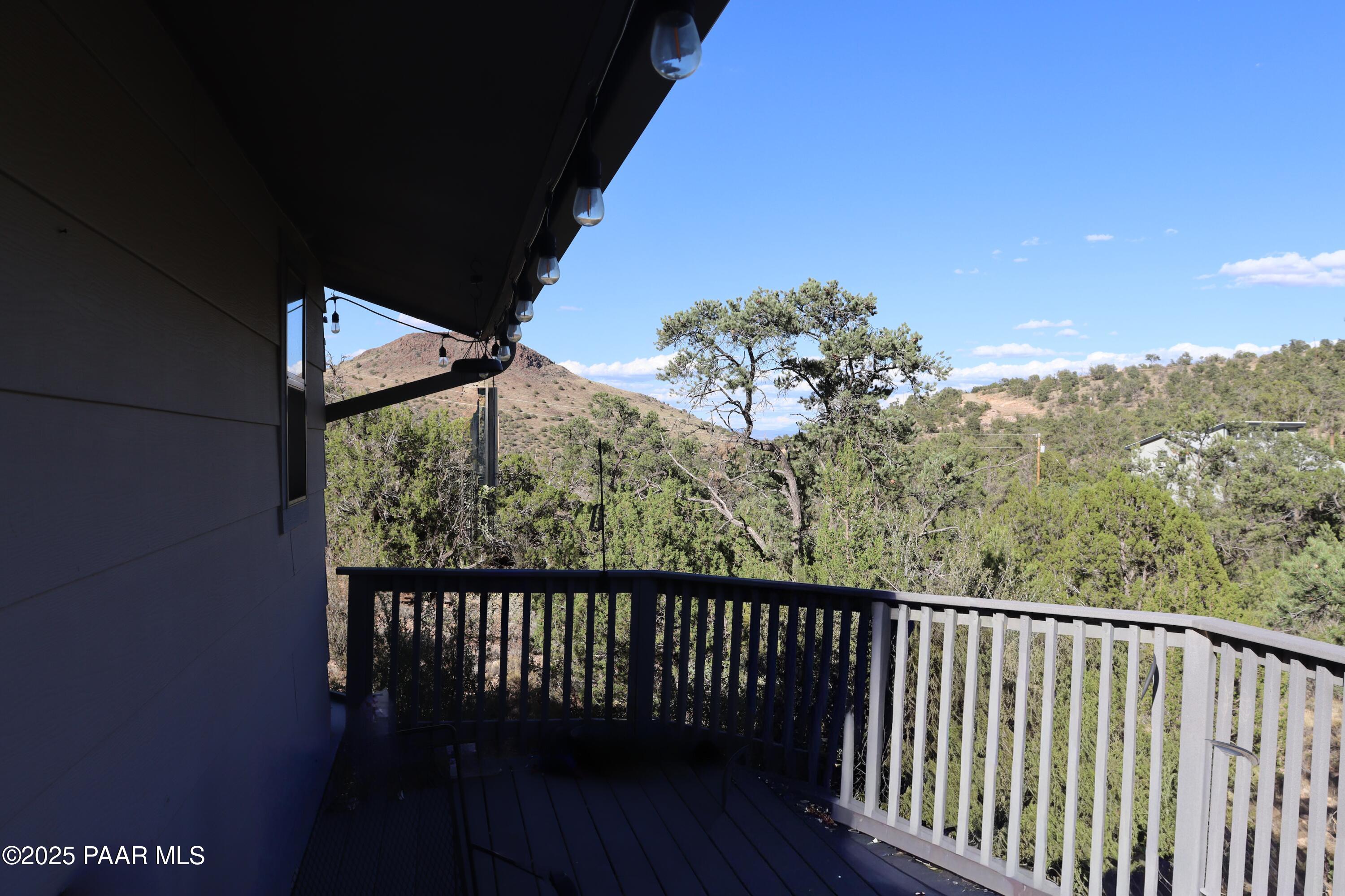 3085 North Diablo Road Chino Valley, AZ 86323 - Photo 13 of 24 a view of a balcony with wooden fence