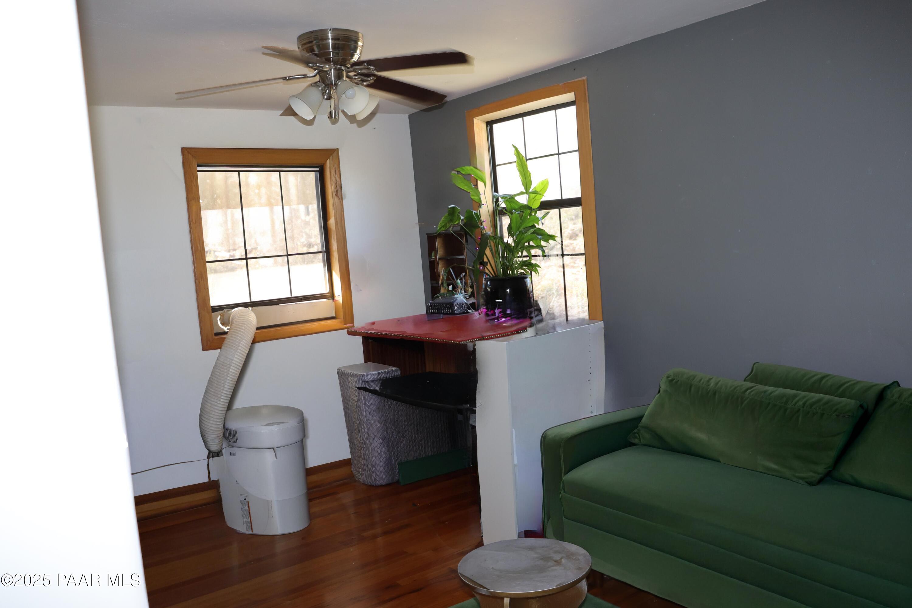 3085 North Diablo Road Chino Valley, AZ 86323 - Photo 21 of 24 a living room with furniture and a window