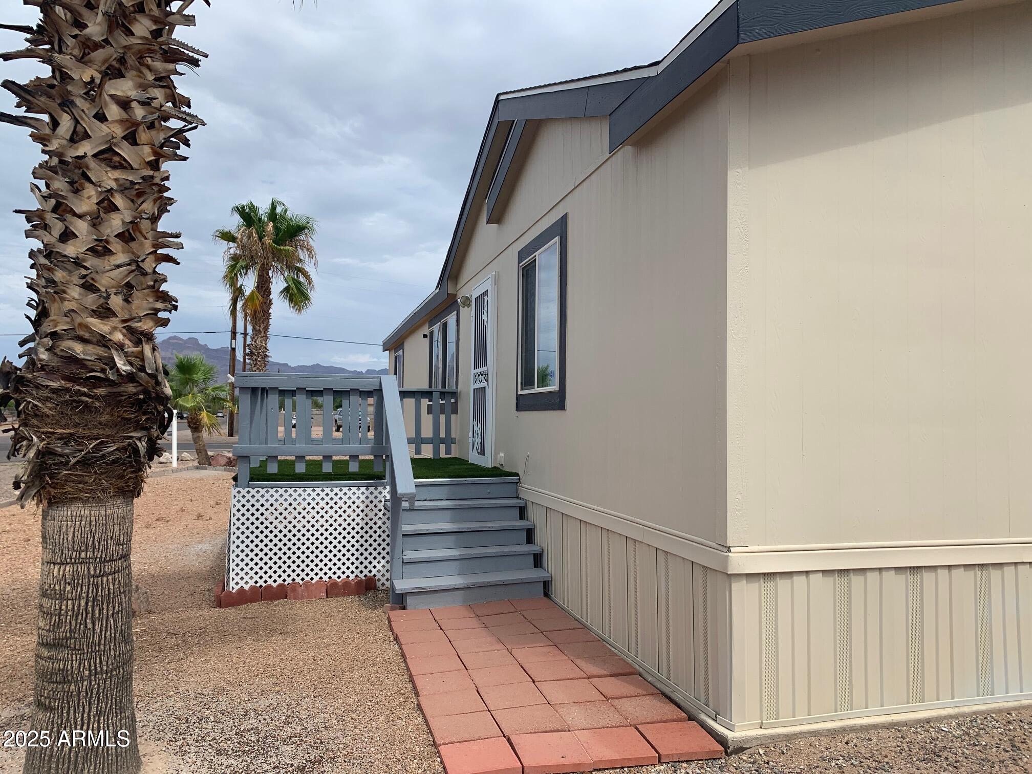 1231 West Roundup Street Apache Junction, AZ 85120 - Photo 22 of 30 a view of entryway with a house