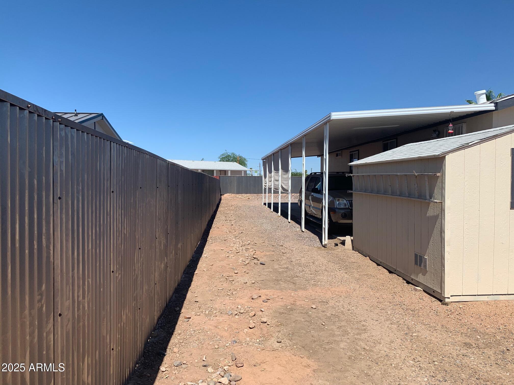 1231 West Roundup Street Apache Junction, AZ 85120 - Photo 25 of 30 BACK FENCE USE