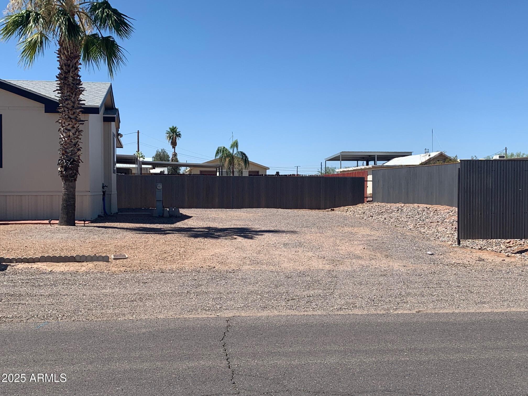1231 West Roundup Street Apache Junction, AZ 85120 - Photo 28 of 30 a view of a terrace with a large tree
