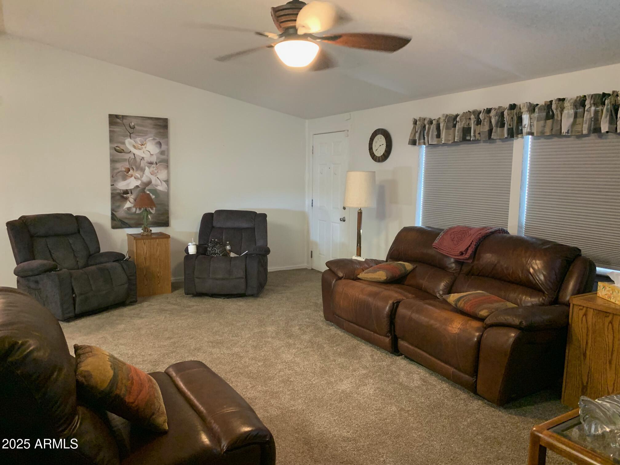 1231 West Roundup Street Apache Junction, AZ 85120 - Photo 3 of 30 a living room with furniture