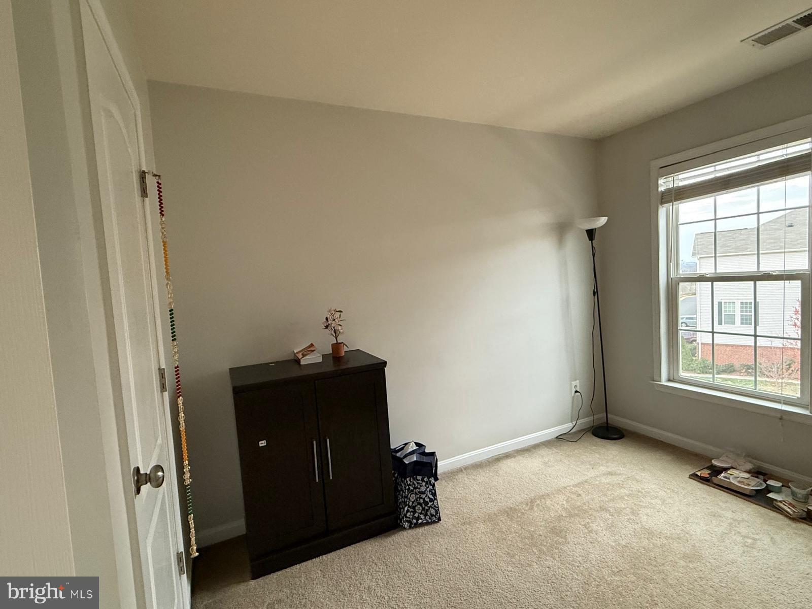 22573 Highcroft Terrace Brambleton, VA 20148 - Photo 8 of 13 wooden floor and window in a room