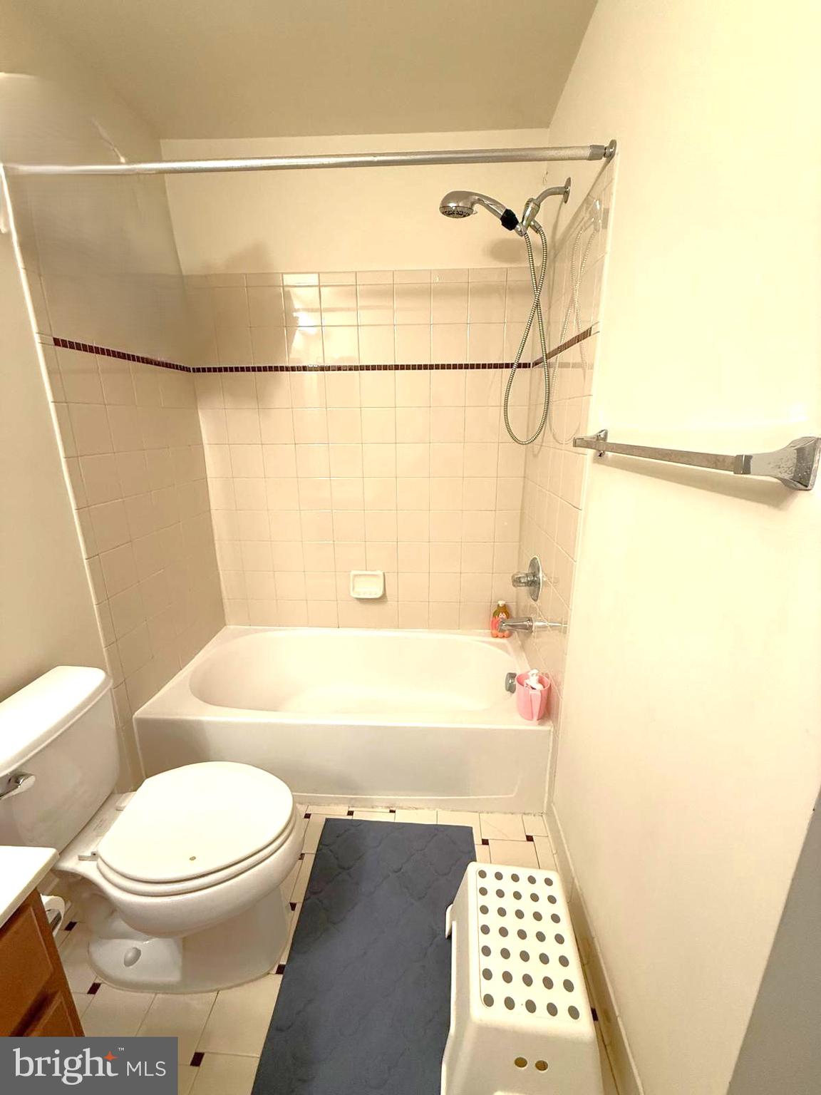 22573 Highcroft Terrace Brambleton, VA 20148 - Photo 10 of 13 a bathroom with a bathtub a sink and a shower