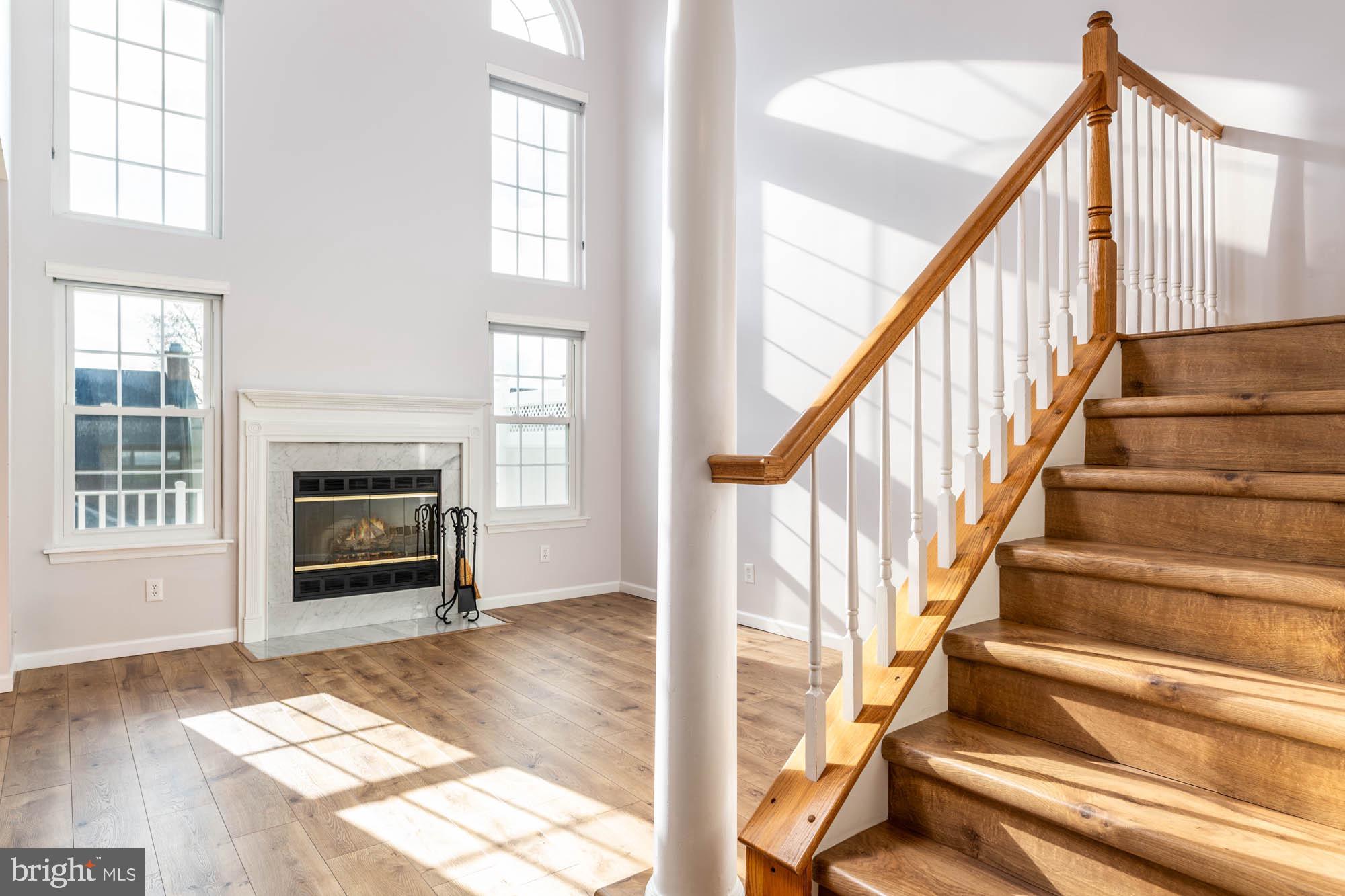 261 Valley Forge Lookout Place Wayne, PA 19087 - Photo 9 of 37 Family room w/ large windows & vaulted ceiling