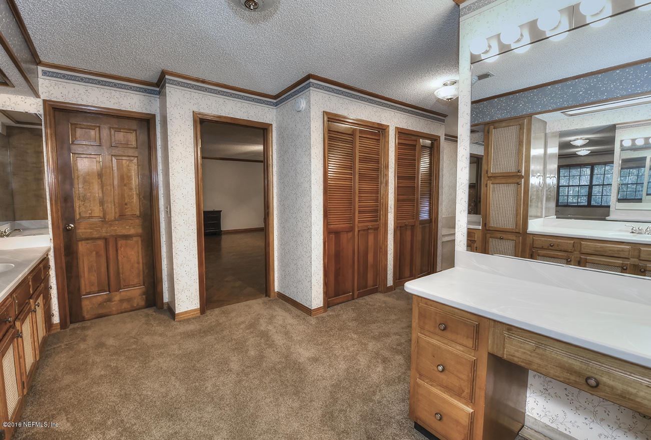 11232 Scott Mill Road Jacksonville, FL 32223 - Photo 27 of 45 Master Closets
