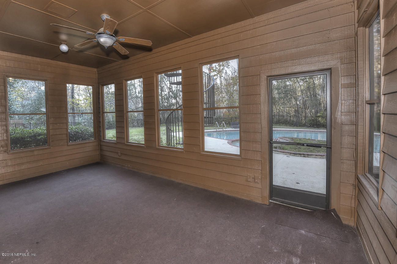 11232 Scott Mill Road Jacksonville, FL 32223 - Photo 32 of 45 Downstairs patio to pool