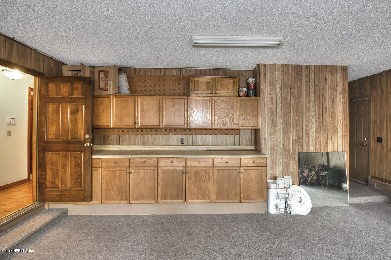 11232 Scott Mill Road Jacksonville, FL 32223 - Photo 41 of 45 Garage cabinets