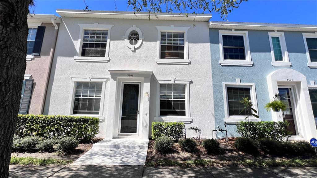 3548 Peppervine Drive Orlando, FL 32828 - Photo 1 of 1 a front view of a house with a yard