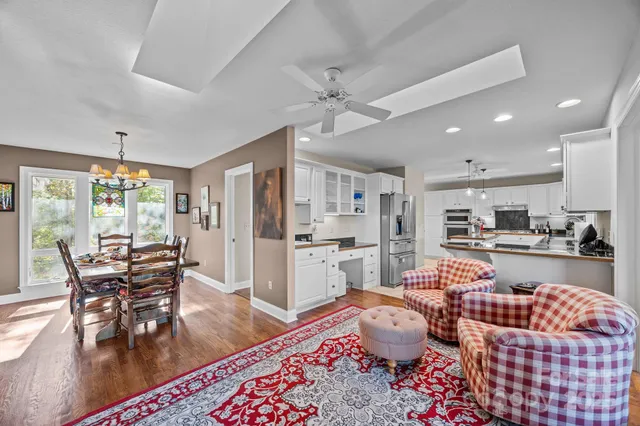 a living room with furniture and a rug
