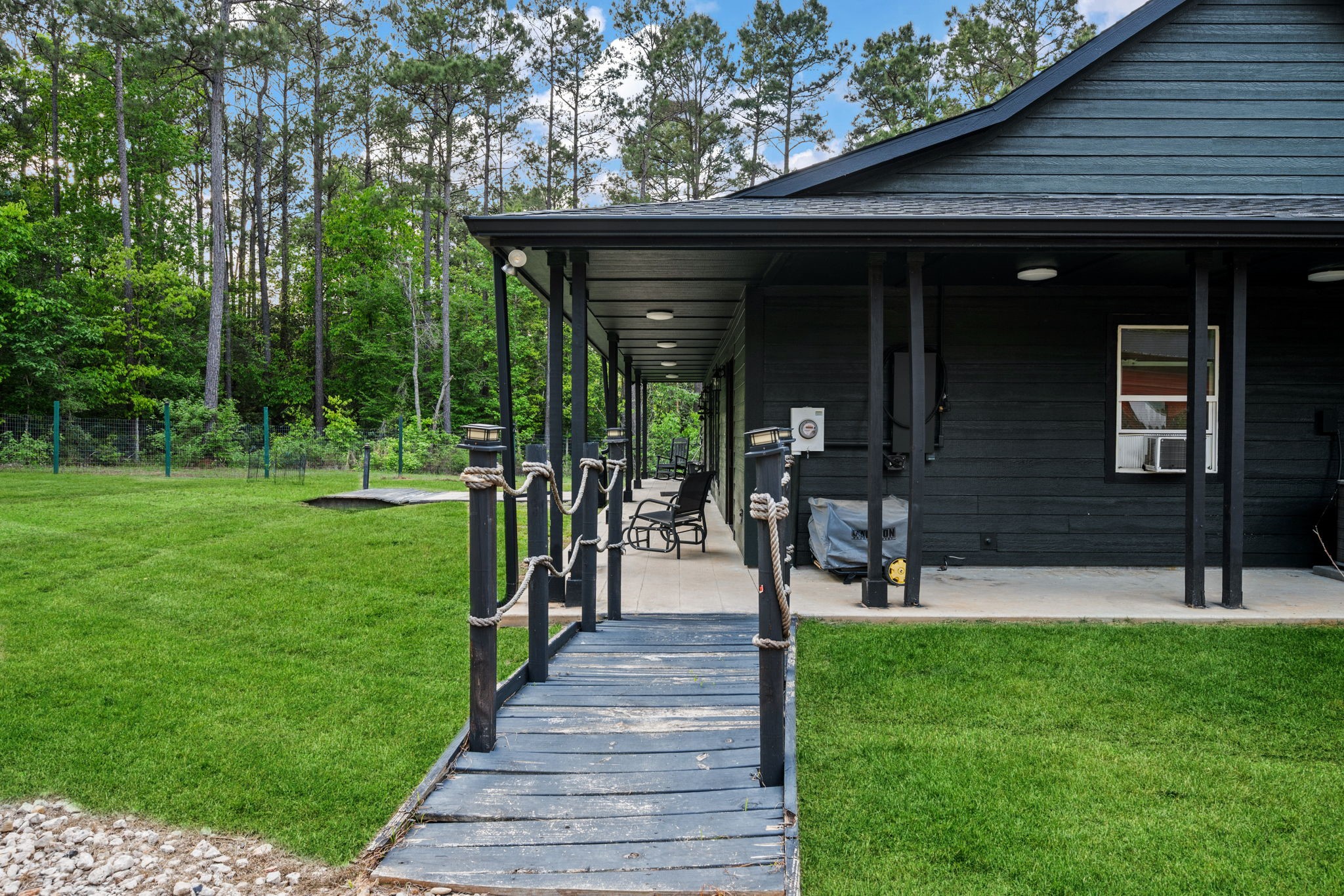 625-635 Gibson Road Livingston, TX 77351 - Photo 25 of 48 Wrap around porch with security lighting.
