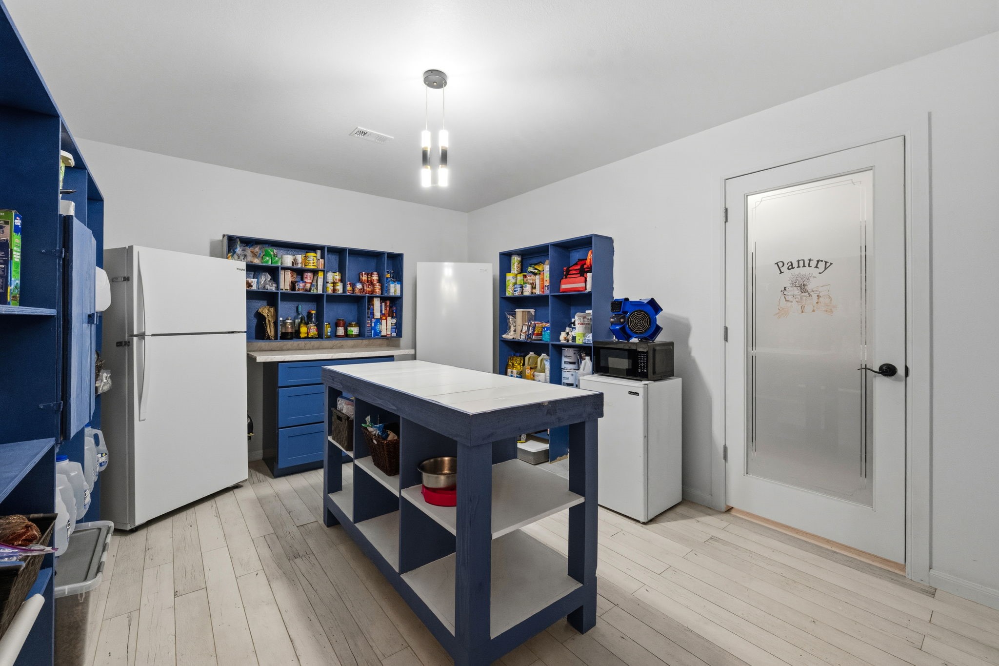 625-635 Gibson Road Livingston, TX 77351 - Photo 37 of 48 Pantry with prep island and plenty of storage.