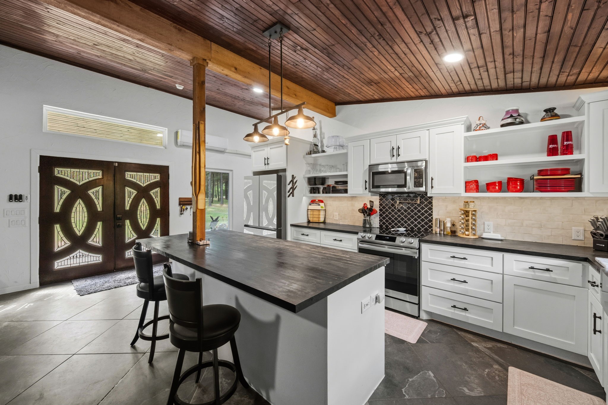 625-635 Gibson Road Livingston, TX 77351 - Photo 9 of 48 Thruout the home is stained beadboard and custom wood details.