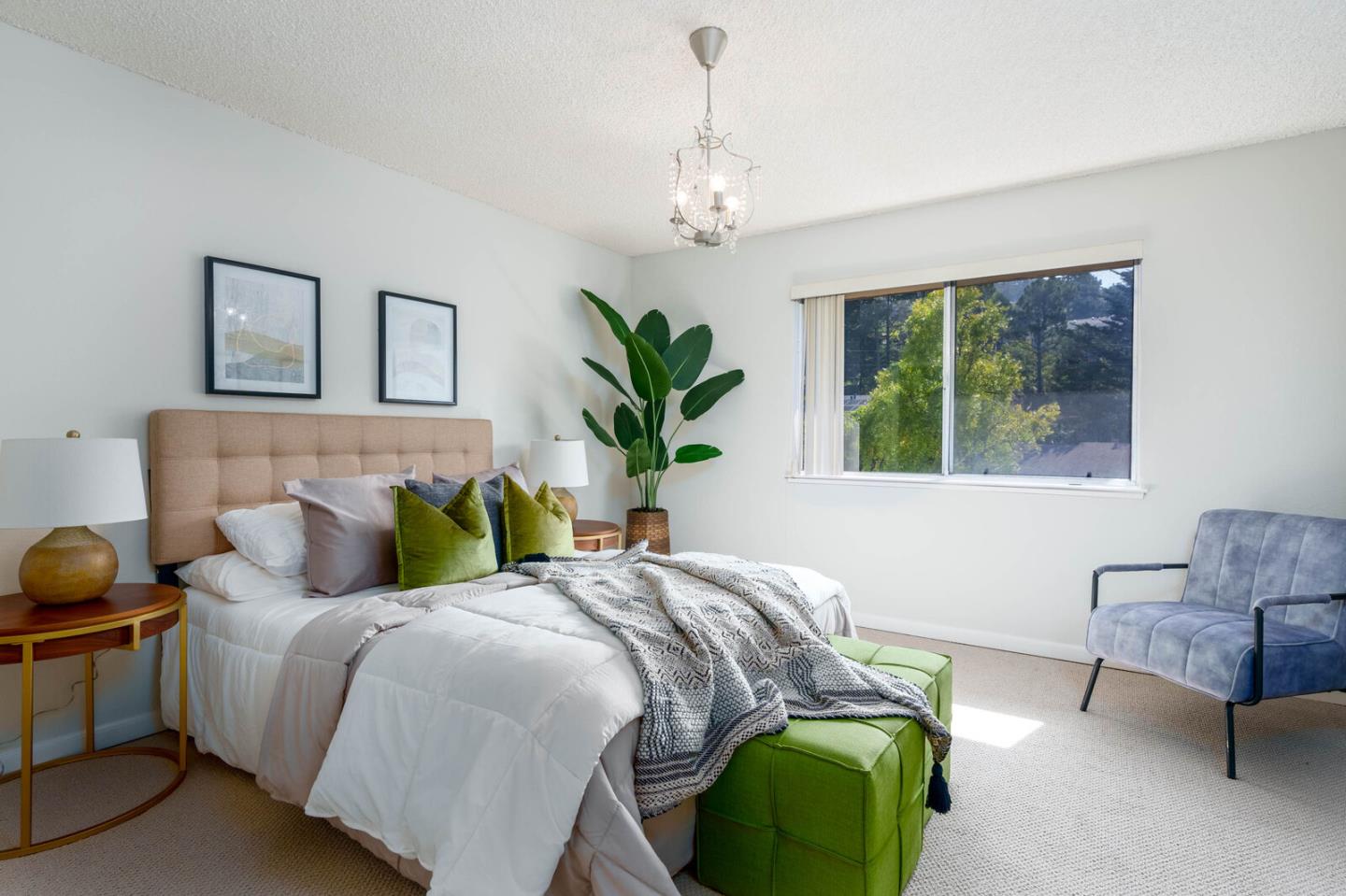 1021 Oddstad Boulevard Pacifica, CA 94044 - Photo 13 of 15 a bedroom with a bed and window