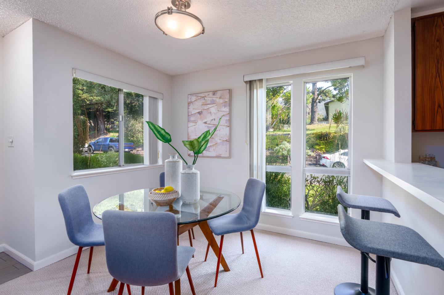 1021 Oddstad Boulevard Pacifica, CA 94044 - Photo 3 of 15 a view of a dining room with furniture window and outside view