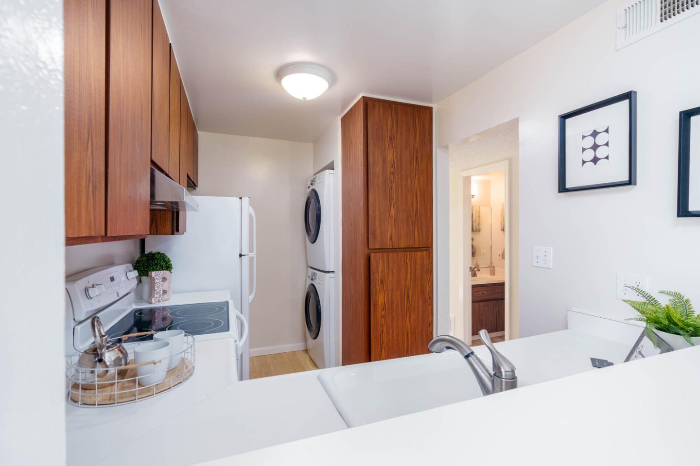 1021 Oddstad Boulevard Pacifica, CA 94044 - Photo 4 of 15 a living room with furniture and a large window