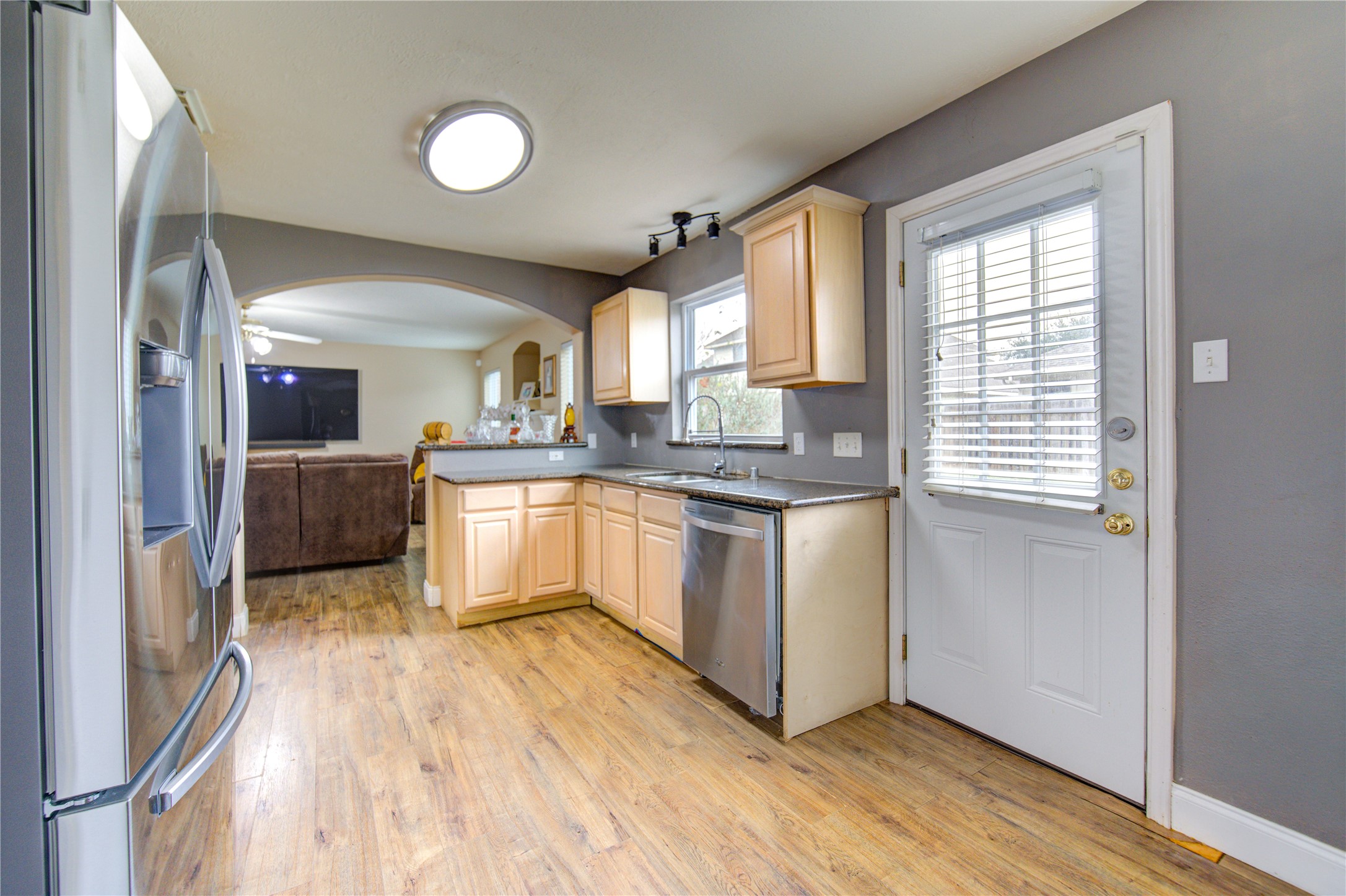 14902 Englebrook Drive Houston, TX 77095 - Photo 17 of 50 a kitchen with stainless steel appliances granite countertop a stove a sink and a window