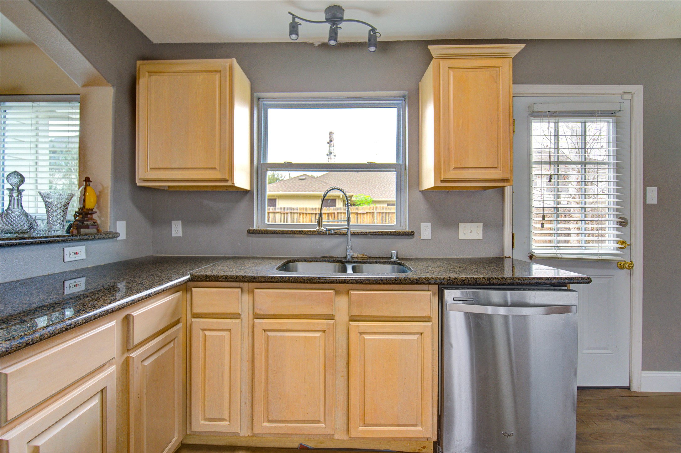 14902 Englebrook Drive Houston, TX 77095 - Photo 18 of 50 a kitchen with granite countertop a sink and a window