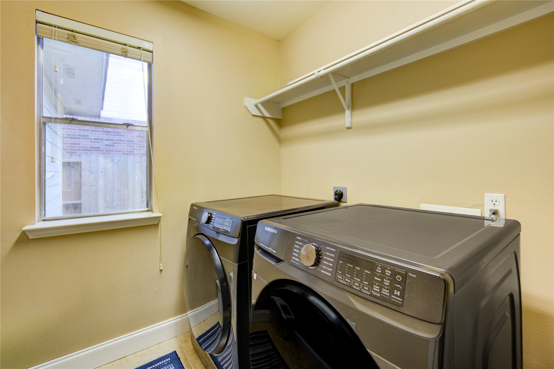 14902 Englebrook Drive Houston, TX 77095 - Photo 20 of 50 a utility room with dryer and washer