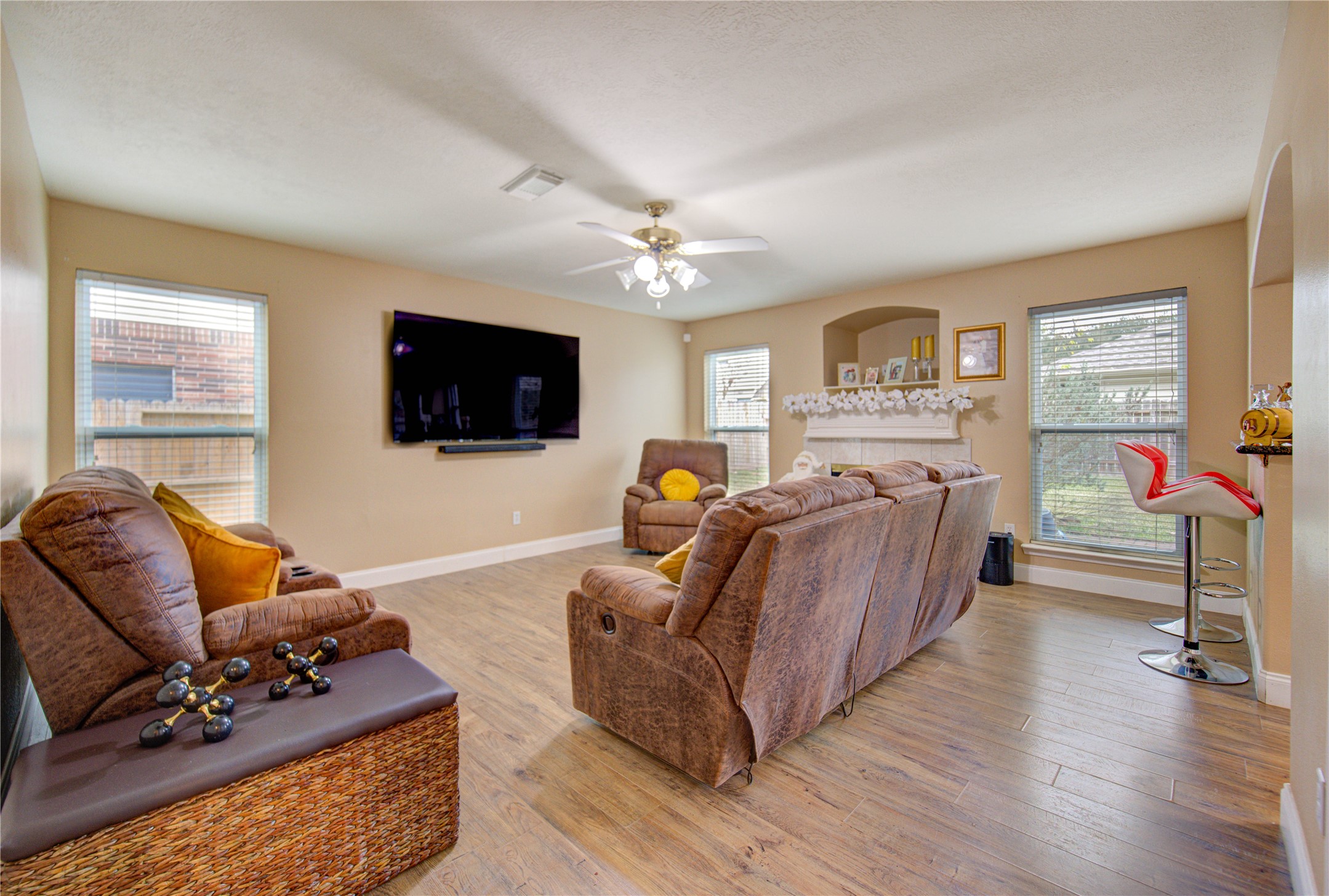 14902 Englebrook Drive Houston, TX 77095 - Photo 24 of 50 a living room with furniture fireplace and a flat screen tv