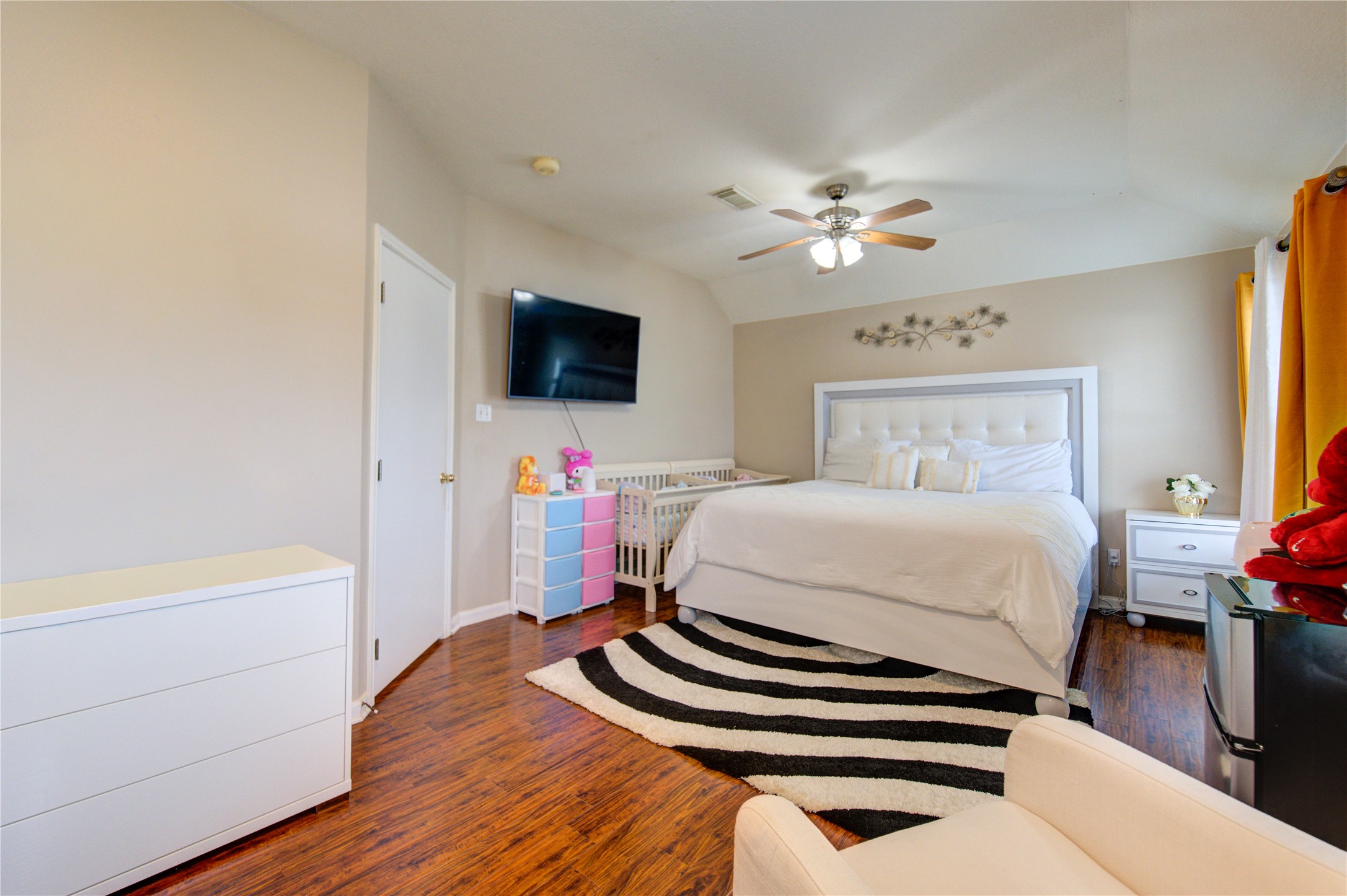 14902 Englebrook Drive Houston, TX 77095 - Photo 36 of 50 a bedroom with a bed and a flat screen tv