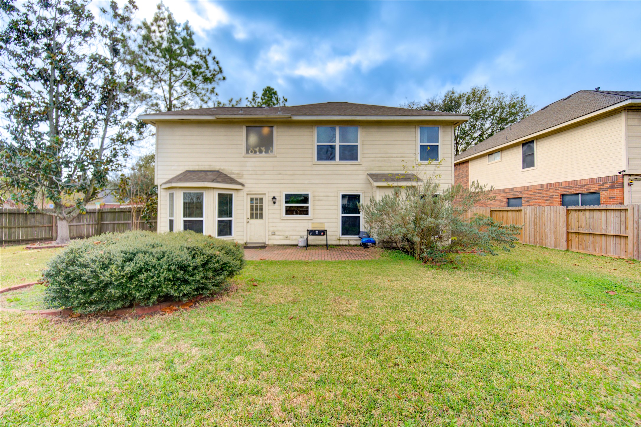 14902 Englebrook Drive Houston, TX 77095 - Photo 45 of 50 a front view of a house with garden