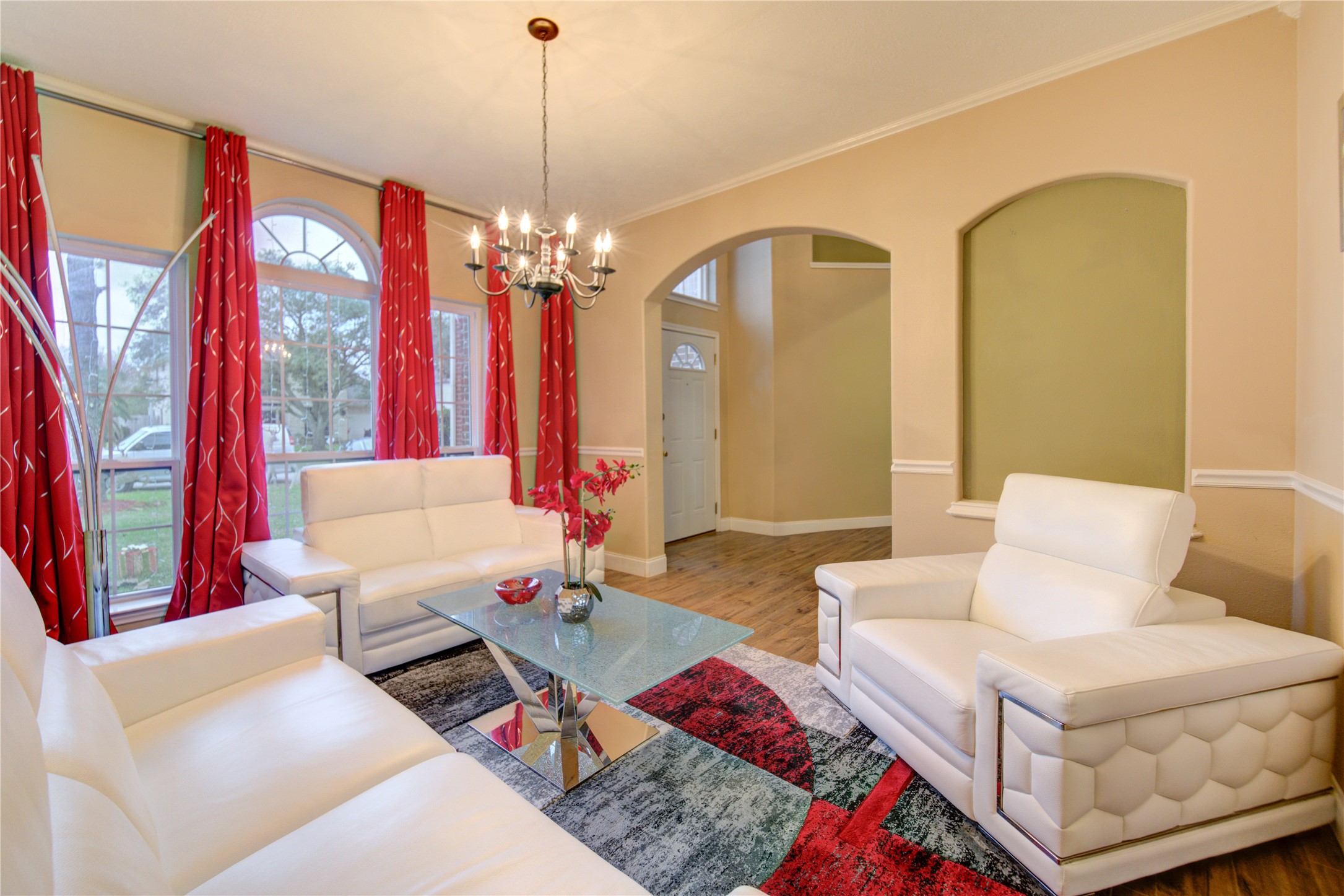 14902 Englebrook Drive Houston, TX 77095 - Photo 9 of 50 a living room with furniture and a chandelier