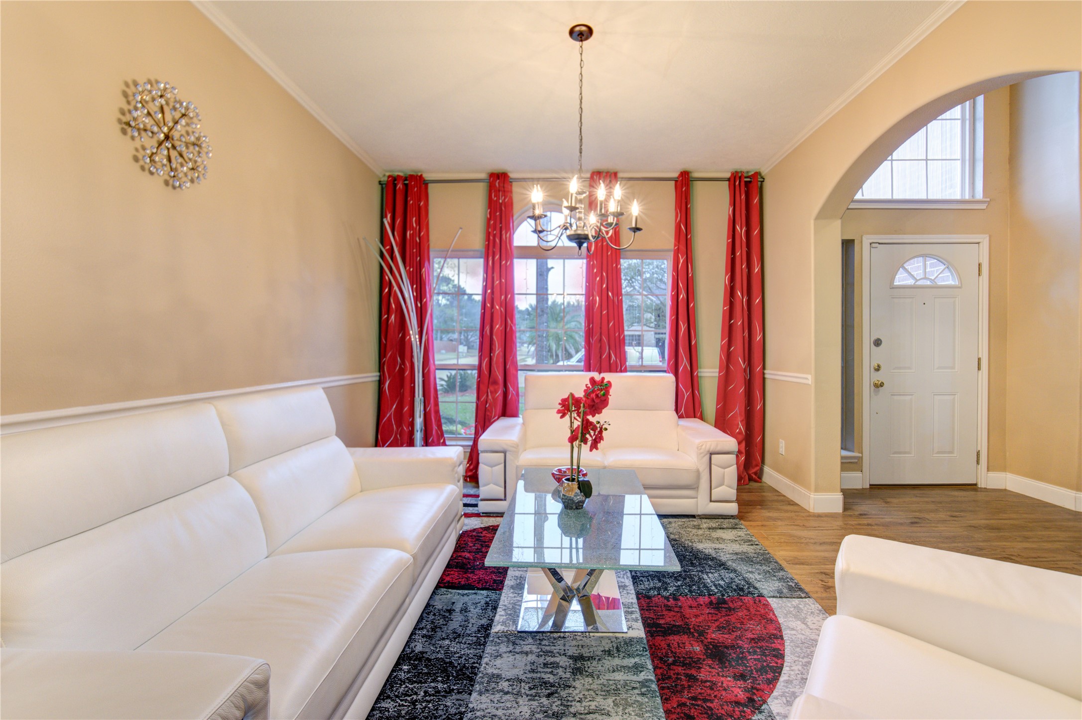 14902 Englebrook Drive Houston, TX 77095 - Photo 10 of 50 a living room with furniture and a chandelier