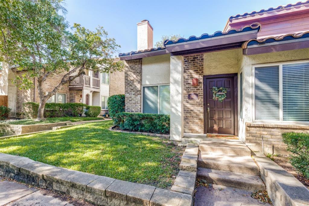 14151 Montfort Drive, Unit 345 Dallas, TX 75254 - Photo 1 of 31 a front view of a house with garden