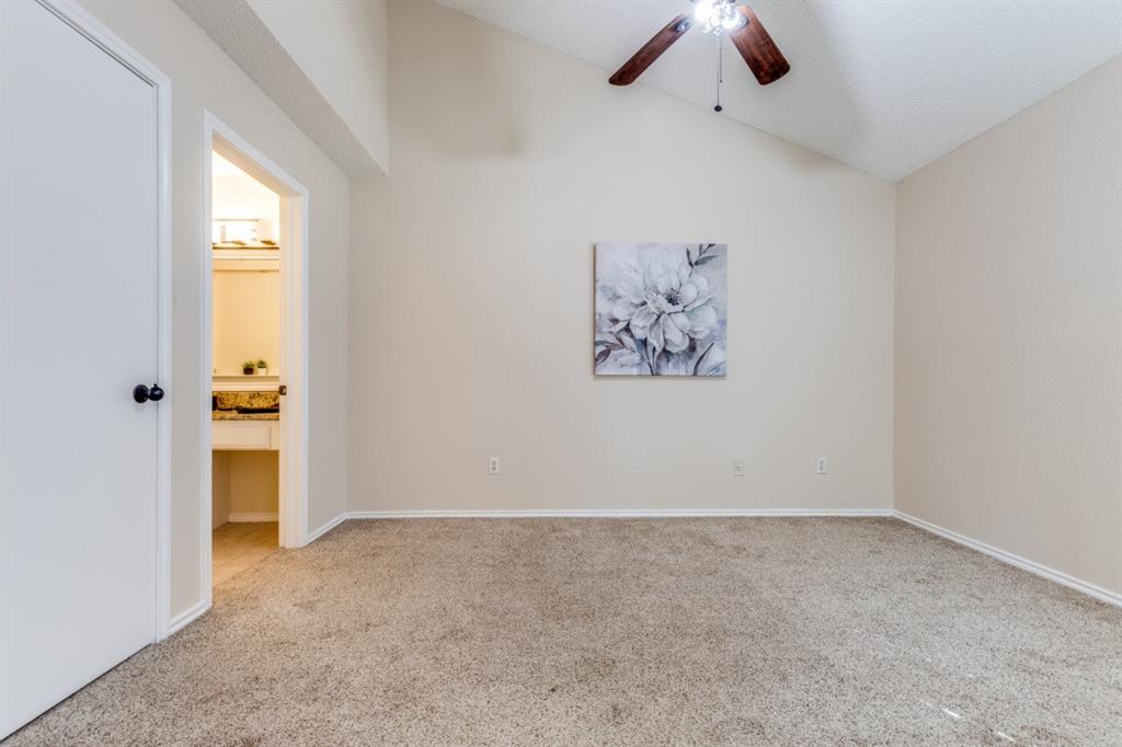 14151 Montfort Drive, Unit 345 Dallas, TX 75254 - Photo 19 of 31 an empty room with a window and a ceiling fan