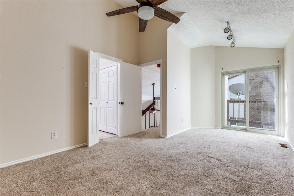 14151 Montfort Drive, Unit 345 Dallas, TX 75254 - Photo 21 of 31 a view of an empty room with a window