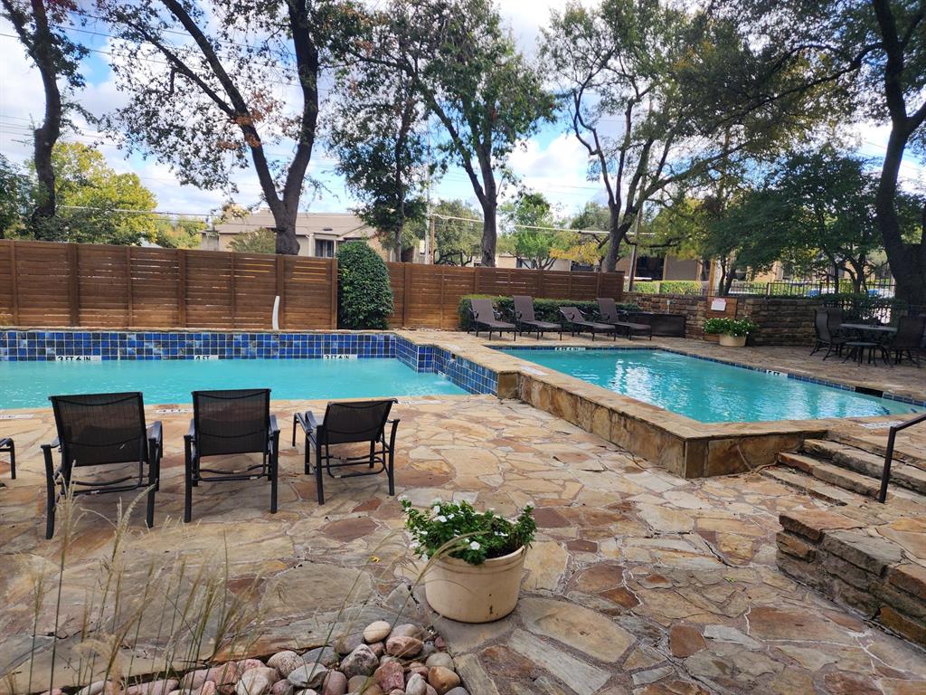 14151 Montfort Drive, Unit 345 Dallas, TX 75254 - Photo 30 of 31 a view of a backyard with sitting area and furniture
