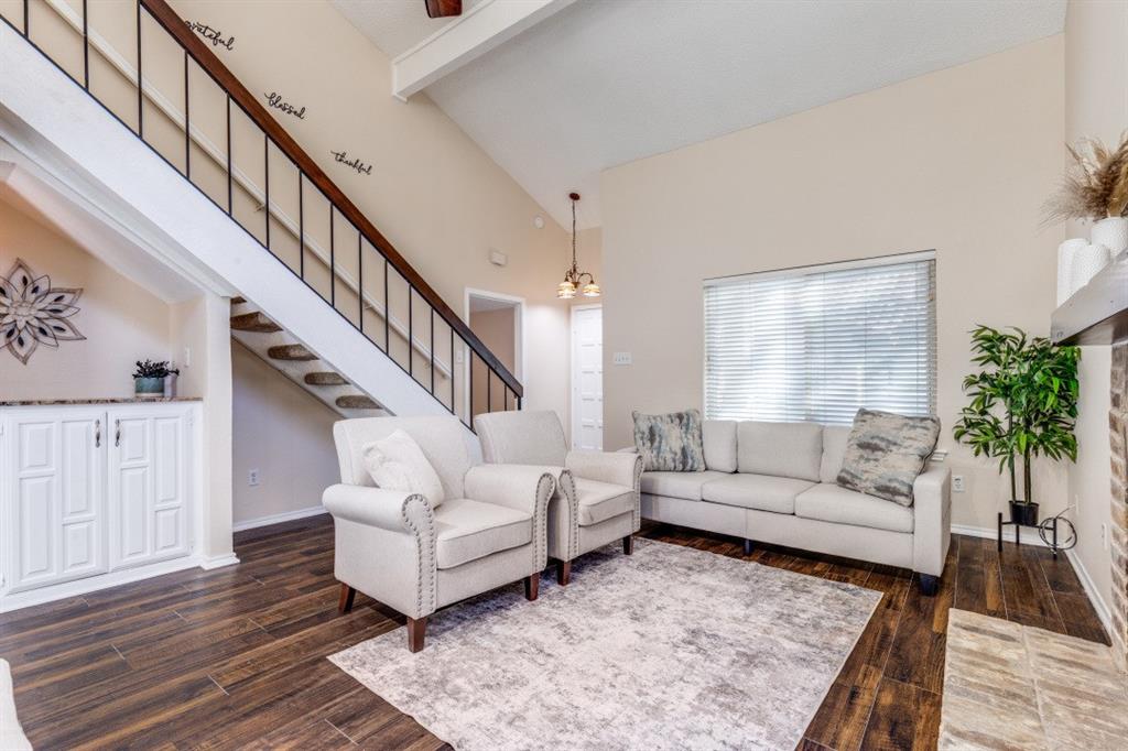 14151 Montfort Drive, Unit 345 Dallas, TX 75254 - Photo 4 of 31 a living room with furniture and a rug