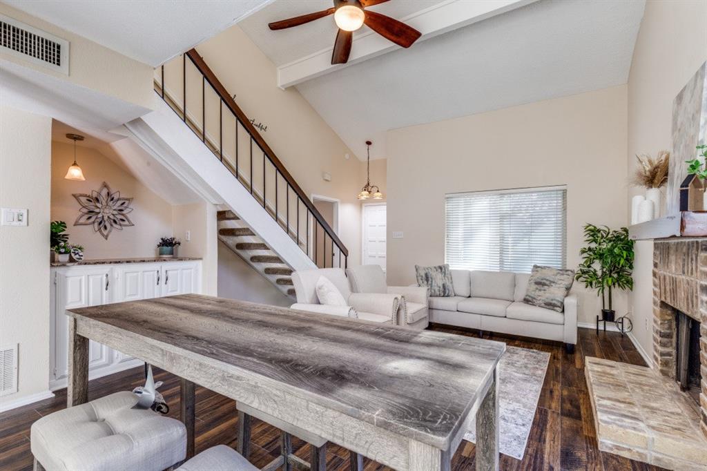14151 Montfort Drive, Unit 345 Dallas, TX 75254 - Photo 6 of 31 a living room with furniture and a fireplace
